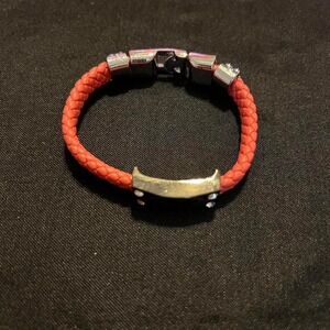 Red leather bracelet with silver accents